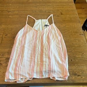 salmon and white stripped tank top with a zipper detailing on the back!